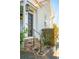 Dark brown front door with a brick stairway leading up to it at 17 H St, Charleston, SC 29403