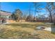 Large backyard with cornhole and firepit at 1706 Blue Heron Ave, Moncks Corner, SC 29461