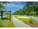 Outdoor basketball court with a nearby park bench at 2005 E Patterson Pt, Hanahan, SC 29410