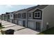 Modern townhomes with attached garages and private driveways at 2006 Scarlett Maple St, Summerville, SC 29486