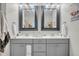 Modern bathroom with double vanity and gray cabinets at 2021 Codorus Ln, Hanahan, SC 29410