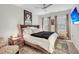 Spacious bedroom with large bed, nightstands, and window coverings at 2021 Codorus Ln, Hanahan, SC 29410