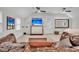 Relaxing bonus room with a large TV and comfortable seating at 2021 Codorus Ln, Hanahan, SC 29410