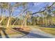 Relaxing community park with a wooden deck and mature trees at 2021 Codorus Ln, Hanahan, SC 29410