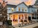 Two-story white house with a gray roof and a covered porch at 2021 Codorus Ln, Hanahan, SC 29410