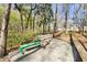 Outdoor fitness station with a workout bench along a wooded path at 2021 Codorus Ln, Hanahan, SC 29410