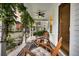 Inviting front porch with rocking chairs, ceiling fan, and stylish decor, perfect for relaxing outdoors at 2021 Codorus Ln, Hanahan, SC 29410
