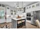 Modern kitchen with white cabinetry and large island at 2021 Codorus Ln, Hanahan, SC 29410