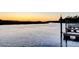 Tranquil riverfront view at sunset with private docks at 2021 Codorus Ln, Hanahan, SC 29410
