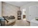 Cozy sitting area with a comfy chair and built-in shelves at 2021 Codorus Ln, Hanahan, SC 29410