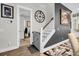 Stairwell with a gray-painted wall and a charming half-door at 2021 Codorus Ln, Hanahan, SC 29410