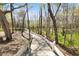 Scenic walking path with white wooden fence and string lights at 2021 Codorus Ln, Hanahan, SC 29410