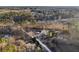 Aerial view of a house on a wooded lot with a long driveway at 326 Turner Ln, Round O, SC 29474