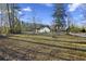House and spacious backyard with mature trees at 326 Turner Ln, Round O, SC 29474