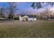 Spacious backyard with large grassy area, providing ample outdoor space at 326 Turner Ln, Round O, SC 29474
