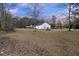 Spacious backyard with large grassy area, providing ample outdoor space at 326 Turner Ln, Round O, SC 29474