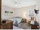 Cozy bedroom with a double bed, wood dresser, and ceiling fan at 326 Turner Ln, Round O, SC 29474