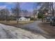Charming single-story home with a covered porch and well-maintained landscaping at 326 Turner Ln, Round O, SC 29474