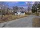 Charming single-story home with a covered porch and well-maintained landscaping at 326 Turner Ln, Round O, SC 29474