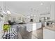 Open concept kitchen with island and breakfast area, featuring granite countertops at 326 Turner Ln, Round O, SC 29474