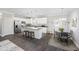 Modern kitchen with white cabinets, granite countertops, and stainless steel appliances at 326 Turner Ln, Round O, SC 29474
