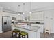 Modern kitchen with white cabinets, granite countertops, and stainless steel appliances at 326 Turner Ln, Round O, SC 29474