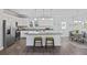 Modern kitchen with white cabinets, granite countertops, and island with seating at 326 Turner Ln, Round O, SC 29474