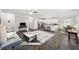 Spacious living room with hardwood floors, light walls, and comfortable furniture at 326 Turner Ln, Round O, SC 29474