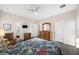 Main bedroom with a floral comforter and en-suite bathroom access at 326 Turner Ln, Round O, SC 29474