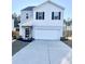 Two-story house with gray siding, white accents, and a two-car garage at 343 Lake Ridge Blvd, Summerville, SC 29483