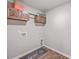 Bright laundry room with wooden cabinets and modern flooring at 343 Lake Ridge Blvd, Summerville, SC 29483