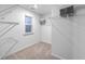 Spacious walk-in closet with wire shelving and neutral carpeting at 343 Lake Ridge Blvd, Summerville, SC 29483