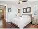 Bright bedroom with a queen bed and ceiling fan at 375 Huger St # G, Charleston, SC 29403