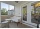 Relaxing screened porch with comfy seating and access to the backyard at 4 Hester St, Charleston, SC 29403