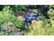 House nestled in a wooded area, seen from above at 400 Murray Blvd, Summerville, SC 29483