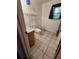 Simple bathroom with tiled floor and a pedestal sink at 400 Murray Blvd, Summerville, SC 29483