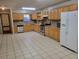 Spacious kitchen with light oak cabinets and tile floor at 400 Murray Blvd, Summerville, SC 29483