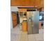 Stainless steel refrigerator and microwave in a bright kitchen at 400 Murray Blvd, Summerville, SC 29483
