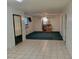 Living room with tile floors and green carpet at 400 Murray Blvd, Summerville, SC 29483