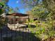 Charming backyard patio with fountain and wrought iron fence at 400 Murray Blvd, Summerville, SC 29483