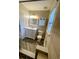 Updated bathroom with white vanity and tile flooring at 406 Chinquapin Dr, Summerville, SC 29485