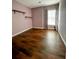 Bedroom with dark wood flooring and floating shelves at 406 Chinquapin Dr, Summerville, SC 29485