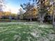 Community with pond, walking path, and lush greenery at 406 Chinquapin Dr, Summerville, SC 29485