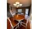 Bright dining area with hardwood floors and a wooden table set at 406 Chinquapin Dr, Summerville, SC 29485