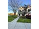 Two story townhome with front yard landscaping and walkway at 406 Chinquapin Dr, Summerville, SC 29485