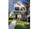 Two-story house with a brick and siding exterior, front porch, and landscaped yard at 406 Chinquapin Dr, Summerville, SC 29485