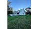 White exterior of townhome with fenced backyard at 406 Chinquapin Dr, Summerville, SC 29485