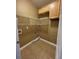 Empty laundry room with tile floor, shelving, and washer/dryer hookups at 406 Chinquapin Dr, Summerville, SC 29485