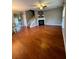 Living room with hardwood floors, fireplace, and plenty of natural light at 406 Chinquapin Dr, Summerville, SC 29485