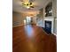 Hardwood floors, fireplace, and an open floor plan to the dining area at 406 Chinquapin Dr, Summerville, SC 29485